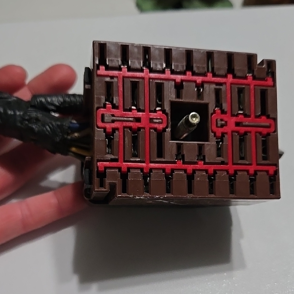 Brown and Red Electrical Component